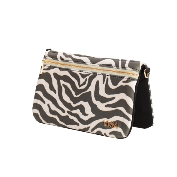 Stylish bi-fold belt-less magnetic bum bag made of khaki green zebra printed neoprene fabric with matching gold insignia and shoulder chain.  Belt bag contains 4 concealed magnets – one in each corner to secure to any waist band.