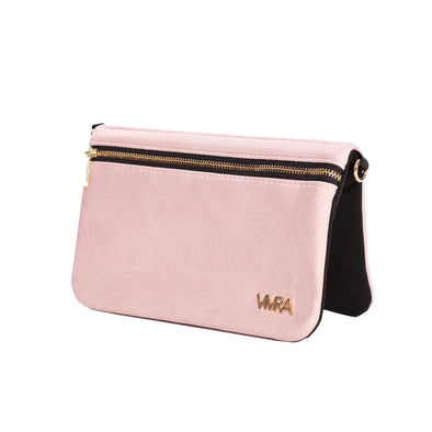 Stylish bi-fold belt-less magnetic bum bag made of light pink neoprene fabric with a subtle floral design.  Waist bag has matching gold insignia and shoulder chain.  Belt bag contains 4 concealed magnets – one in each corner to secure to any waist band.